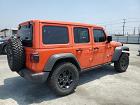 2023 Jeep Wrangler 4xe Orange vin: 1C4JJXN67PW705747