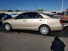 2005 Toyota Camry Le Золотой vin: 4T1BE32K15U087042
