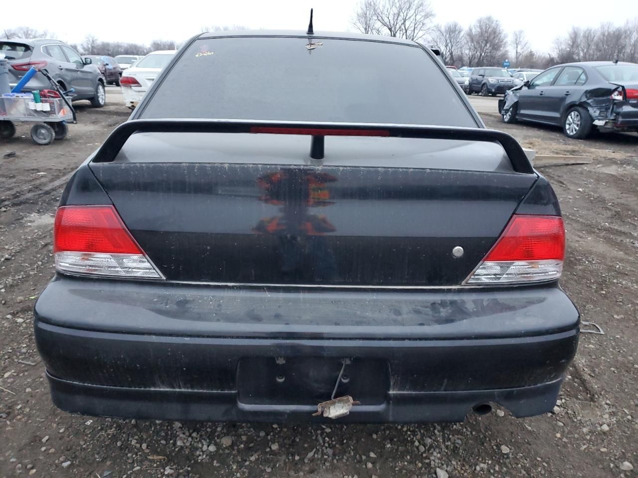 Price & History 2002 Mitsubishi Lancer Oz Rally 2.0l 4 vin