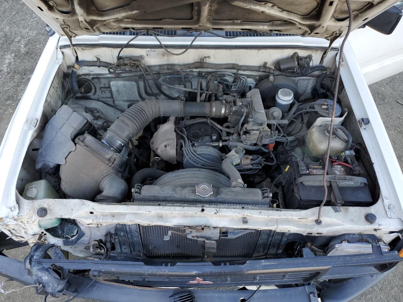 Price & History 1990 Mitsubishi Mighty Max / S 2.4l 4 vin